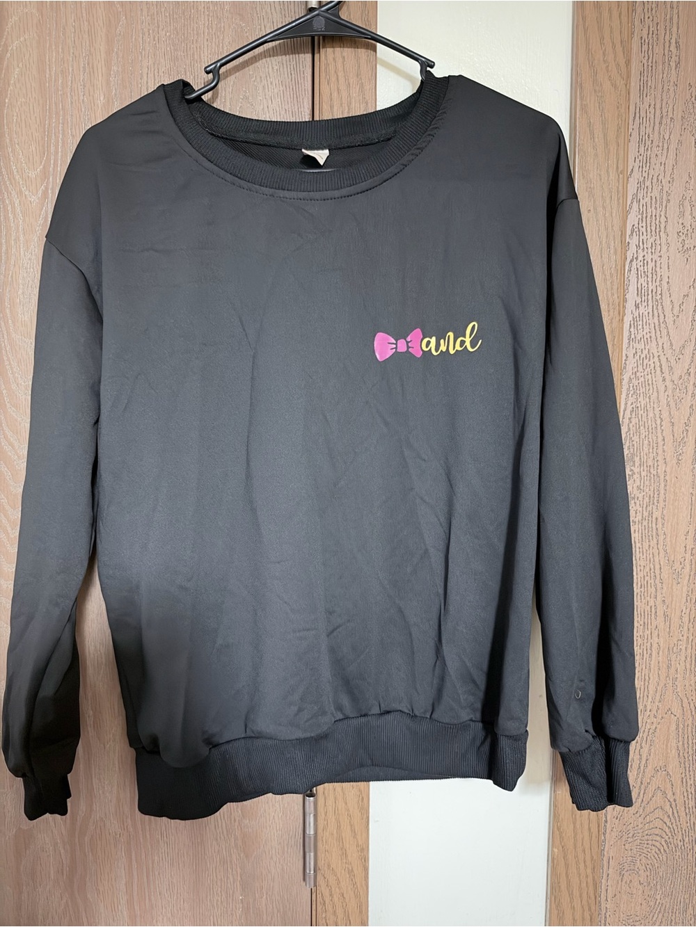 SHEIN Black Sweatshirt with Pink Bow and Yellow Script